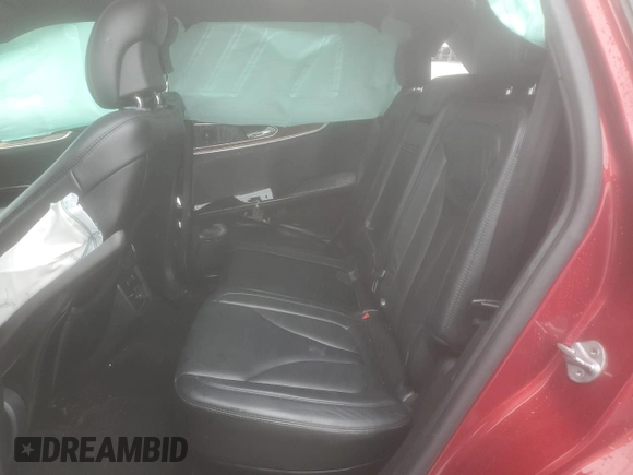 2016 Lincoln MKX Select z VIN 2LMTJ8KR1GBL36642, wystawiony jako Copart lot #52174735 z przebiegiem 107 827 mil mil oraz Szkoda całkowita • Salvage title. Historia ofert i sprzedaży dostępna na DreamBid. Obrazek 10.