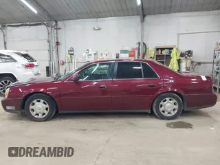 2002 Cadillac DeVille with VIN 1G6KD54Y12U214732, listed as a IAAI auction lot 42018412 with 139,474 mi miles. Bid and sale history available at carsss.com. Image 14.