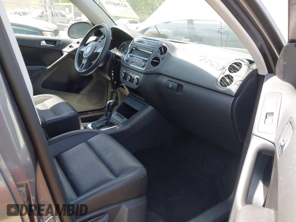 2012 Volkswagen Tiguan SE with VIN WVGAV7AX9CW004362, listed as a IAAI auction lot 42260316 with 163,444 mi miles and . Bid and sale history available at DreamBid. Image 5.