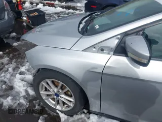 2016 Ford Focus SE with VIN 1FADP3F21GL325603, listed as a IAAI auction lot 41562523 with 97,749 mi miles. Bid and sale history available at carsss.com. Image 13.