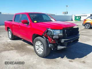 2022 Nissan Frontier SV z VIN 1N6ED1EJ3NN612086, wystawiony jako IAAI lot #41603542 z przebiegiem 65 797 mil mil oraz . Historia ofert i sprzedaży dostępna na DreamBid. Obrazek 1.