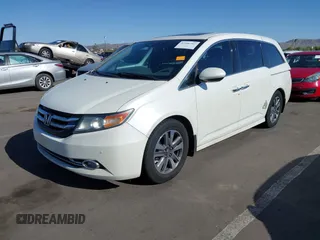 2014 Honda Odyssey Touring with VIN 5FNRL5H97EB037361, listed as a IAAI auction lot 42106742 with 198,279 mi miles and . Bid and sale history available at DreamBid. Image 17.