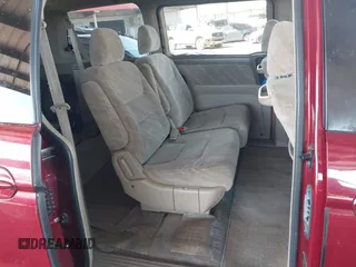 2004 Honda Odyssey EX with VIN 5FNRL186X4B013892, listed as a IAAI auction lot 41731037 with 202,893 mi miles and . Bid and sale history available at DreamBid. Image 8.