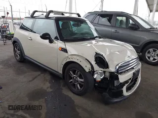 2013 MINI Hardtop with VIN WMWSU3C53DT684999, listed as a IAAI auction lot 42163800 with 89,774 mi miles and . Bid and sale history available at DreamBid. Image 1.