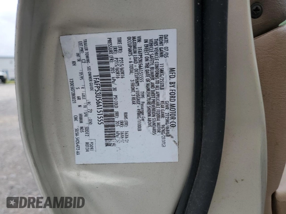 2006 Ford Taurus SE z VIN 1FAFP53U56A151555, wystawiony jako Copart lot #55227665 z przebiegiem 146 109 mil mil oraz Szkoda całkowita • Salvage title. Historia ofert i sprzedaży dostępna na DreamBid. Obrazek 12.