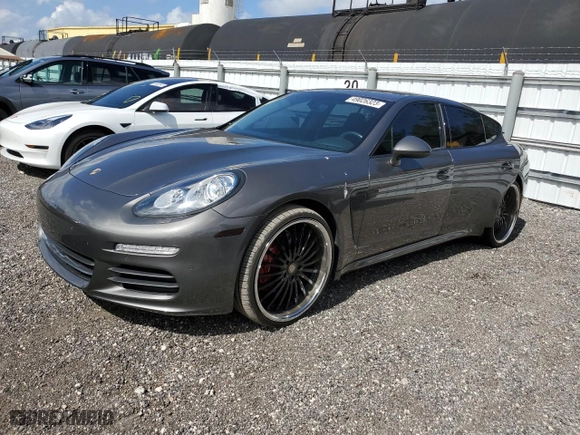 2016 Porsche Panamera 4 with VIN WP0AA2A74GL006367, listed as a Copart auction lot 49026323 with 57,384 mi miles. Bid and sale history available at carsss.com. Image 1.