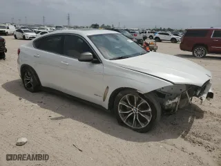 2017 BMW X6 sDrive35i with VIN 5UXKU0C52H0F99663, listed as a Copart auction lot 51950705 with NaN miles and Salvage Title. Bid and sale history available at carsss.com. Image 4.