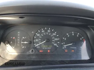 2000 Toyota Camry CE z VIN 4T1BG22K2YU711908, wystawiony jako Copart lot #56294515 z przebiegiem 110 871 mil mil oraz Szkoda całkowita • Salvage title. Historia ofert i sprzedaży dostępna na DreamBid. Obrazek 9.