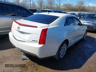 2014 Cadillac ATS Standard AWD with VIN 1G6AG5RX0E0101806, listed as a IAAI auction lot 41828755 with 114,857 mi miles and . Bid and sale history available at carsss.com. Image 4.