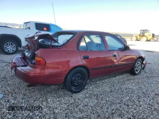 2002 Chevrolet Prizm z VIN 1Y1SK52842Z413505, wystawiony jako Copart lot #69058464 z przebiegiem 100 014 mil mil oraz Tytuł czysty. Historia ofert i sprzedaży dostępna na DreamBid. Obrazek 3.