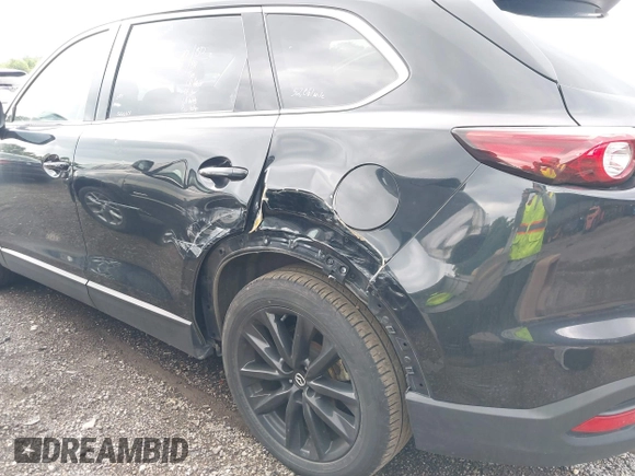 2023 Mazda CX-9 Touring Plus with VIN JM3TCBAY2P0657825, listed as a IAAI auction lot 42756562 with 52,090 mi miles and . Bid and sale history available at DreamBid. Image 6.