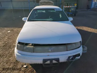 1995 Mercury Sable GS with VIN 1MELM50UXSG617772, listed as a Copart auction lot 86834064 with 120,994 mi miles and Salvage Title. Bid and sale history available at carsss.com. Image 5.