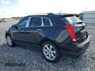 2013 Cadillac SRX Performance Collection with VIN 3GYFNHE37DS649235, listed as a Copart auction lot 56939285 with 104,692 mi miles and Salvage title. Bid and sale history available at DreamBid. Image 2.