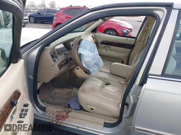 2008 Mercury Grand Marquis LS z VIN 2MEFM75V78X657966, wystawiony jako IAAI lot #41802080 z przebiegiem 113 846 mil mil oraz . Historia ofert i sprzedaży dostępna na DreamBid. Obrazek 5.