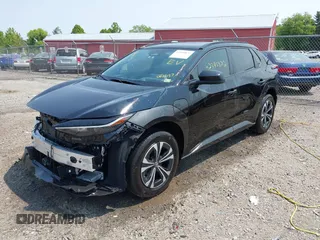 2024 Toyota bZ4X XLE with VIN JTMABACA7RA061457, listed as a IAAI auction lot 42395872 with 16,558 mi miles and . Bid and sale history available at DreamBid. Image 21.