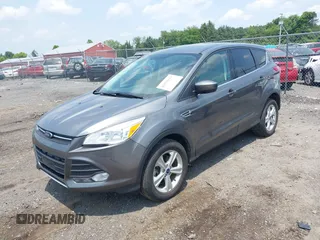 2014 Ford Escape SE with VIN 1FMCU9GX1EUE21729, listed as a IAAI auction lot 42475113 with 116,050 mi miles and . Bid and sale history available at DreamBid. Image 2.
