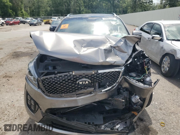 2016 Kia Sorento SXL with VIN 5XYPK4A18GG028124, listed as a Copart auction lot 59665324 with 63,502 mi miles and Salvage Title. Bid and sale history available at carsss.com. Image 5.