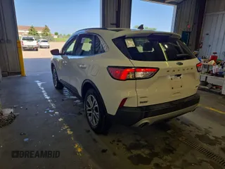 2021 Ford Escape SEL Hybrid with VIN 1FMCU9CZ1MUB25597, listed as a IAAI auction lot 42663573 with 79,061 mi miles and . Bid and sale history available at DreamBid. Image 52.