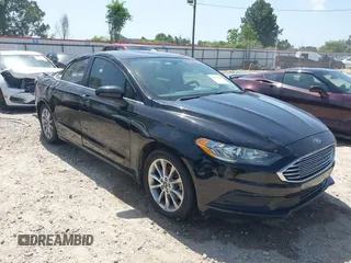 2017 Ford Fusion SE z VIN 3FA6P0HDXHR198388, wystawiony jako IAAI lot #42231069 z przebiegiem 143 709 mil mil oraz . Historia ofert i sprzedaży dostępna na DreamBid. Obrazek 1.
