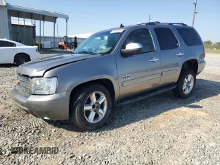 2012 Chevrolet Tahoe LT with VIN 1GNSCBE04CR258954, listed as a Copart auction lot 52866995 with 135,873 mi miles and Salvage title. Bid and sale history available at DreamBid. Image 1.