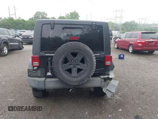 2007 Jeep Wrangler Rubicon with VIN 1J4GA64117L149666, listed as a IAAI auction lot 42252464 with 100,791 mi miles and . Bid and sale history available at DreamBid. Image 16.