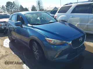 2018 Mazda CX-3 Touring z VIN JM1DKFC73J0301449, wystawiony jako IAAI lot #41678604 z przebiegiem 105 249 mil mil oraz . Historia ofert i sprzedaży dostępna na DreamBid. Obrazek 13.