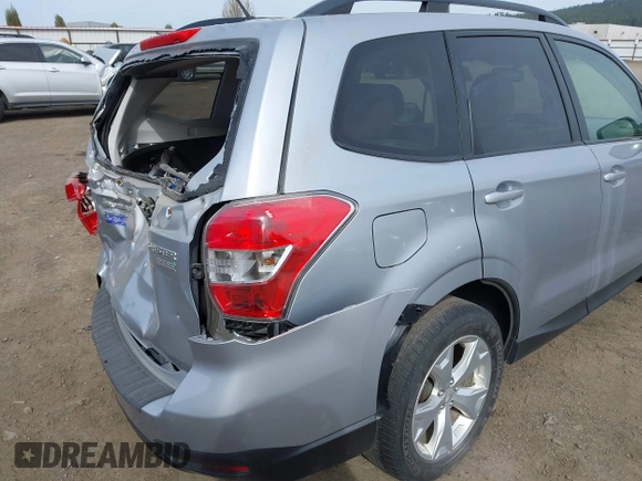 2014 Subaru Forester Premium with VIN JF2SJAEC8EH450679, listed as a IAAI auction lot 41432350 with 276,006 mi miles and . Bid and sale history available at DreamBid. Image 17.