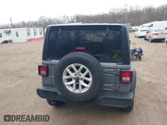 2023 Jeep Wrangler Sport S with VIN 1C4HJXDN0PW638934, listed as a IAAI auction lot 41719467 with 16,686 mi miles and . Bid and sale history available at DreamBid. Image 17.