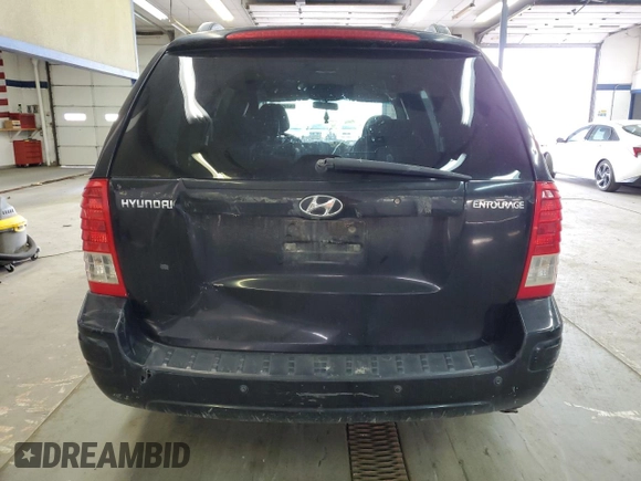2008 Hyundai Entourage GLS z VIN KNDMC233086051923, wystawiony jako Copart lot #47754735 z przebiegiem Nie podano mil oraz Szkoda całkowita • Salvage title. Historia ofert i sprzedaży dostępna na DreamBid. Obrazek 6.