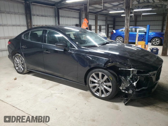 2019 Mazda 3 Premium with VIN 3MZBPAEM7KM102348, listed as a Copart auction lot 84587534 with 73,125 mi miles and Salvage Title. Bid and sale history available at DreamBid. Image 4.
