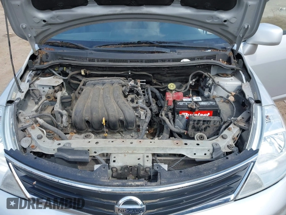 2012 Nissan Versa S with VIN 3N1BC1CP2CK272290, listed as a IAAI auction lot 42030626 with 136,000 mi miles. Bid and sale history available at carsss.com. Image 10.