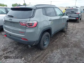 2023 Jeep Compass Trailhawk with VIN 3C4NJDDNXPT562694, listed as a IAAI auction lot 42370873 with 21,988 mi miles and . Bid and sale history available at DreamBid. Image 4.