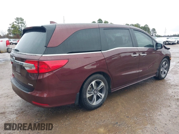 2019 Honda Odyssey Touring with VIN 5FNRL6H82KB060023, listed as a IAAI auction lot 41451199 with 82,994 mi miles. Bid and sale history available at carsss.com. Image 4.