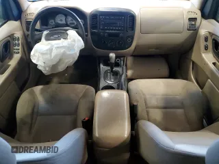 2007 Ford Escape XLS с VIN 1FMYU02Z37KA61744, выставлен на аукционе Copart как лот 52870065 с пробегом Не указан миль и Списание • Salvage title. История ставок и продаж доступна на DreamBid. Изображение 8.
