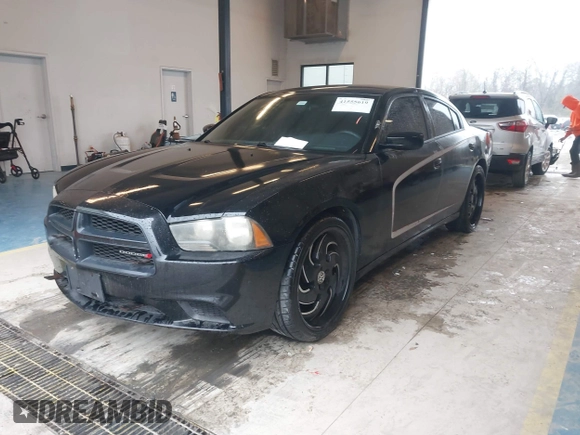 2012 Dodge Charger Police with VIN 2C3CDXAG3CH305132, listed as a IAAI auction lot 41555619 with 128,777 mi miles. Bid and sale history available at carsss.com. Image 2.