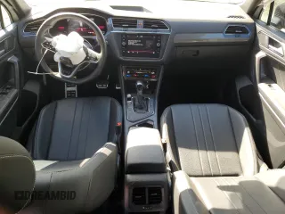 2023 Volkswagen Tiguan SE R-Line Black with VIN 3VVCB7AX6PM001044, listed as a Copart auction lot 47365565 with 20,059 mi miles and Salvage title. Bid and sale history available at DreamBid. Image 8.