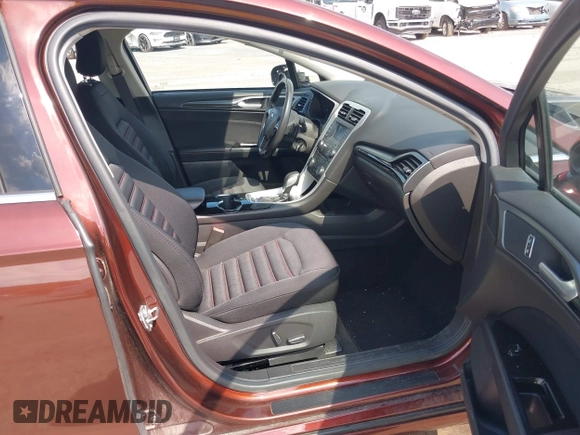 2015 Ford Fusion SE z VIN 3FA6P0T91FR202568, wystawiony jako IAAI lot #42596108 z przebiegiem 134 829 mil mil oraz . Historia ofert i sprzedaży dostępna na DreamBid. Obrazek 5.