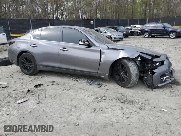 2014 Infiniti Q50 Premium with VIN JN1BV7AP2EM674992, listed as a Copart auction lot 52479915 with 220,813 mi miles and Salvage Title. Bid and sale history available at carsss.com. Image 4.