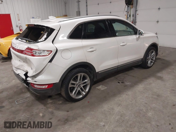 2016 Lincoln MKC Reserve with VIN 5LMTJ3DH2GUJ24052, listed as a IAAI auction lot 41666912 with 62,818 mi miles and . Bid and sale history available at DreamBid. Image 4.