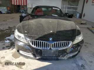 2015 BMW Z4 sDrive35i with VIN WBALM7C52FJ799104, listed as a Copart auction lot 88354535 with 56,560 mi miles and Salvage Title. Bid and sale history available at carsss.com. Image 5.