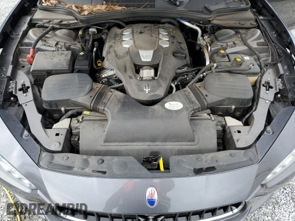 2014 Maserati Ghibli z VIN ZAM57XSA9E1096594, wystawiony jako Copart lot #47187285 z przebiegiem 114 050 mil mil oraz Szkody całkowita. Historia ofert i sprzedaży dostępna na DreamBid. Obrazek 11.