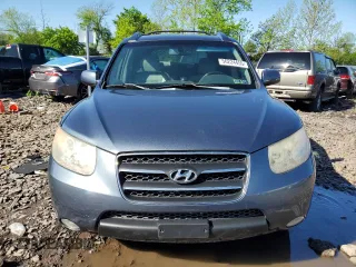 2007 Hyundai Santa Fe SE with VIN 5NMSH73E77H125590, listed as a Copart auction lot 56224455 with 185,319 mi miles and Salvage title. Bid and sale history available at DreamBid. Image 5.