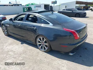 2015 Jaguar XJ R-Sport with VIN SAJWJ1CD6F8V83990, listed as a IAAI auction lot 41936162 with Not Provided miles and . Bid and sale history available at DreamBid. Image 3.