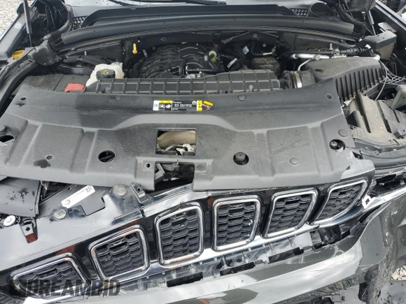 2023 Jeep Grand Cherokee Limited z VIN 1C4RJKBG8P8728476, wystawiony jako Copart lot #57998385 z przebiegiem 21 440 mil mil oraz Szkoda całkowita • Salvage title. Historia ofert i sprzedaży dostępna na DreamBid. Obrazek 12.