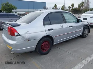 2001 Honda Civic LX with VIN 1HGES15511L023007, listed as a IAAI auction lot 41577660 with 288,408 mi miles. Bid and sale history available at carsss.com. Image 4.