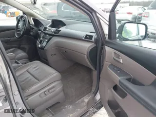 2013 Honda Odyssey EX-L with VIN 5FNRL5H65DB055040, listed as a IAAI auction lot 41615182 with 246,225 mi miles. Bid and sale history available at carsss.com. Image 5.