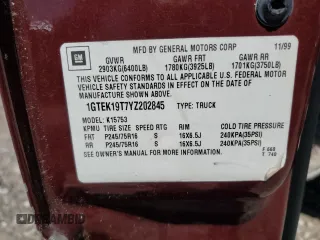 2000 GMC New Sierra 1500 SLE with VIN 1GTEK19T7YZ202845, listed as a Copart auction lot 51596555 with 243,067 mi miles and Salvage Title. Bid and sale history available at carsss.com. Image 12.
