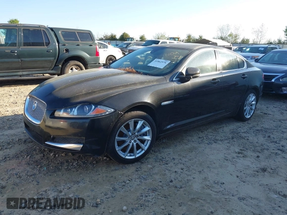 2013 Jaguar XF I4 RWD with VIN SAJWA0ES1DPS63520, listed as a IAAI auction lot 41862976 with 1 mi miles. Bid and sale history available at carsss.com. Image 2.