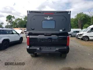 2023 Toyota Tundra Platinum with VIN 5TFNA5EC3PX017198, listed as a Copart auction lot 62857595 with 16,571 mi miles and Salvage title. Bid and sale history available at DreamBid. Image 6.
