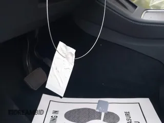 2024 Tesla Model Y Long Range z VIN 7SAYGDEEXRA236065, wystawiony jako IAAI lot #41834658 z przebiegiem 20 313 mil mil oraz . Historia ofert i sprzedaży dostępna na DreamBid. Obrazek 11.
